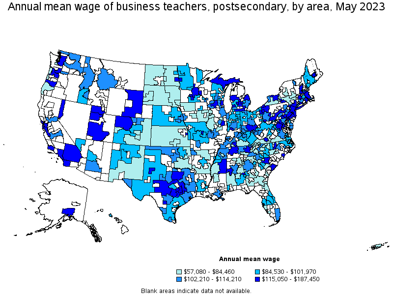 Map of annual mean wages of business teachers, postsecondary by area, May 2023