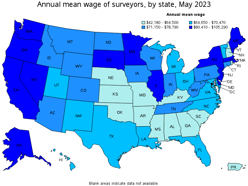 Map of annual mean wages of surveyors by state, May 2023