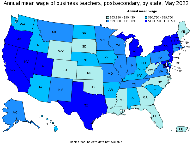 Map of annual mean wages of business teachers, postsecondary by state, May 2022
