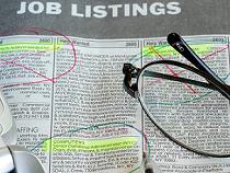 Job listings in a newspaper