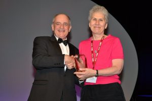 Wendy Martinez receiving Founders Award from American Statistical Association President Barry Nussbaum.