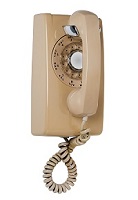 Beige wall phone with rotary dial
