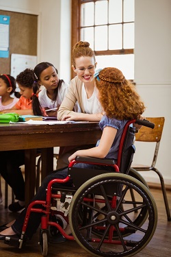 teacher talking to students