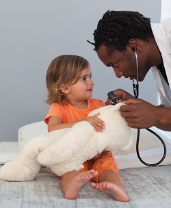 physician assistant with a young child