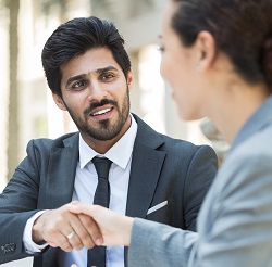 Two businesspeople shaking hands