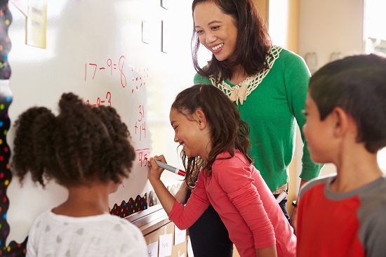 Teacher with her students