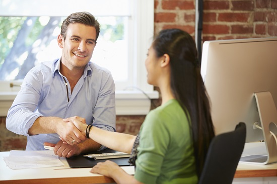 Interviewee shaking hands with interviewer