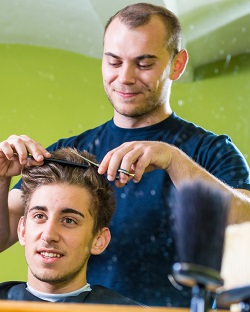 Barber cutting hair