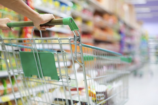 Woman pushing a grocery cart