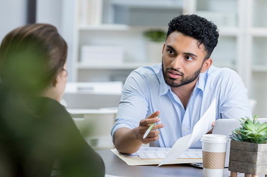 A lawyer consulting a client.