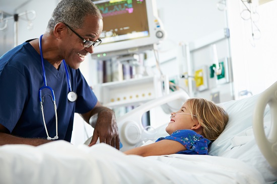 Male nurse talking with a patient