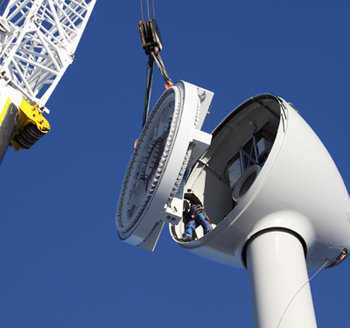 Worker inside wind turbine nacelle