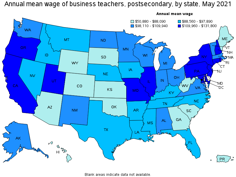 Map of annual mean wages of business teachers, postsecondary by state, May 2021