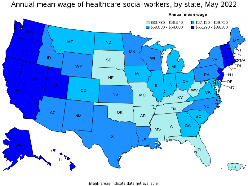 Map of annual mean wages of healthcare social workers by state, May 2022