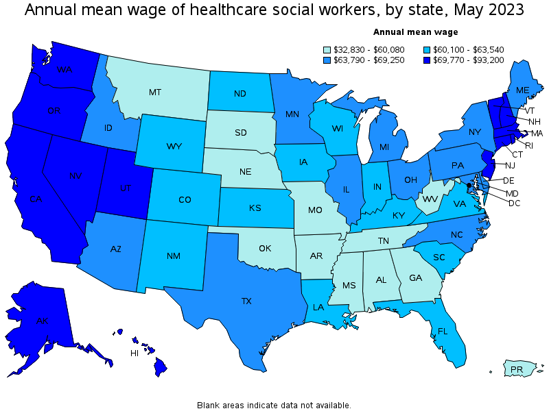 Map of annual mean wages of healthcare social workers by state, May 2023