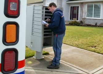how much money does a postal carrier make