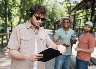 A tour guide examining the trip schedule