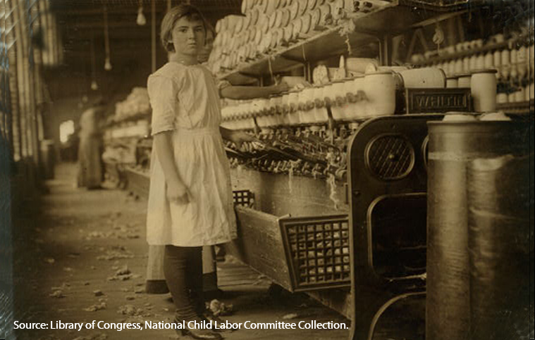 Young girl working at spooling room in the Brazos Valley Cotton Mill, West, Texas, about 1913.