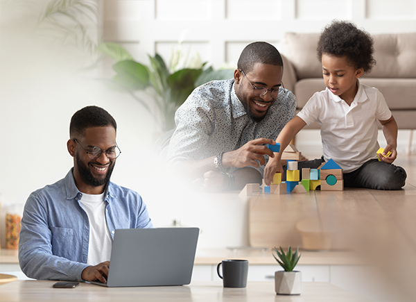a man working at a computer and a man playing with a child