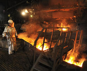 Worker near fiery pit