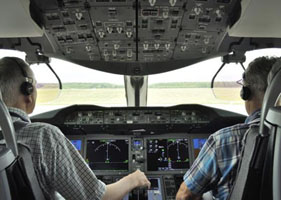 Airline pilots in cockpit