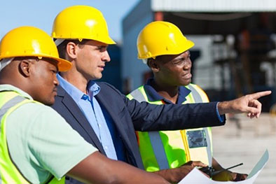 Construction workers speaking